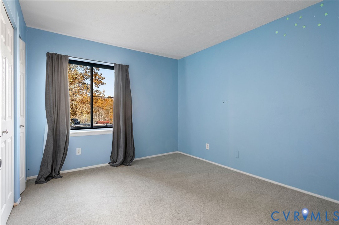 1501 Largo Road, Unit 201 Henrico, VA 23238 - Photo 8 of 31 an empty room with windows