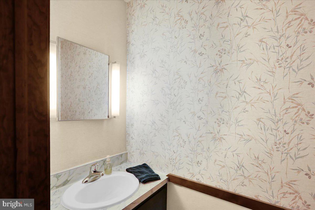 830 North Church Road Reading, PA 19608 - Photo 28 of 57 a bathroom with a sink and a mirror
