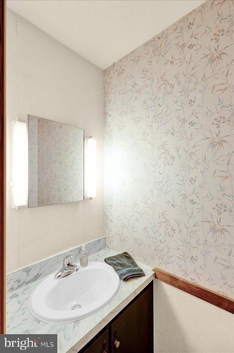 830 North Church Road Reading, PA 19608 - Photo 29 of 57 a bathroom with a sink and a mirror