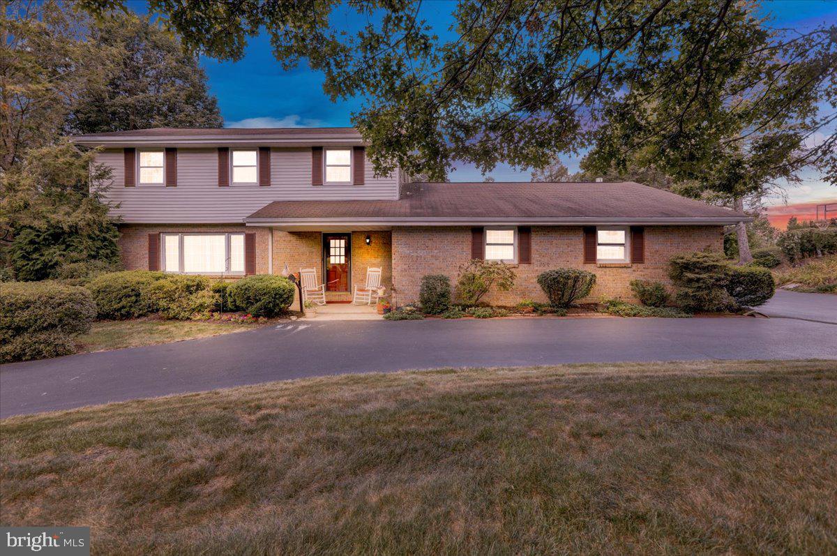 830 North Church Road Reading, PA 19608 - Photo 54 of 57 a front view of a house with garden