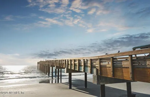 a view of a water fountain in front of a house