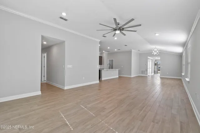 a view of a hallway with a window