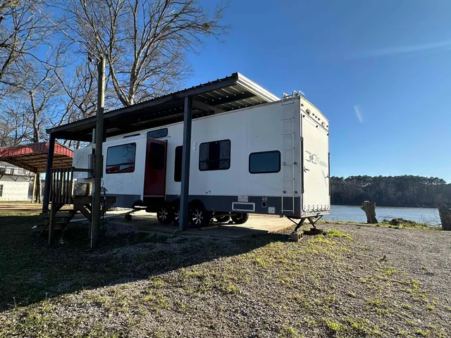 a view of a building with a yard