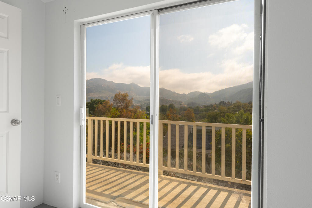 6079 Cedar Street Simi Valley, CA 93063 - Photo 12 of 31 a view of a wooden balcony