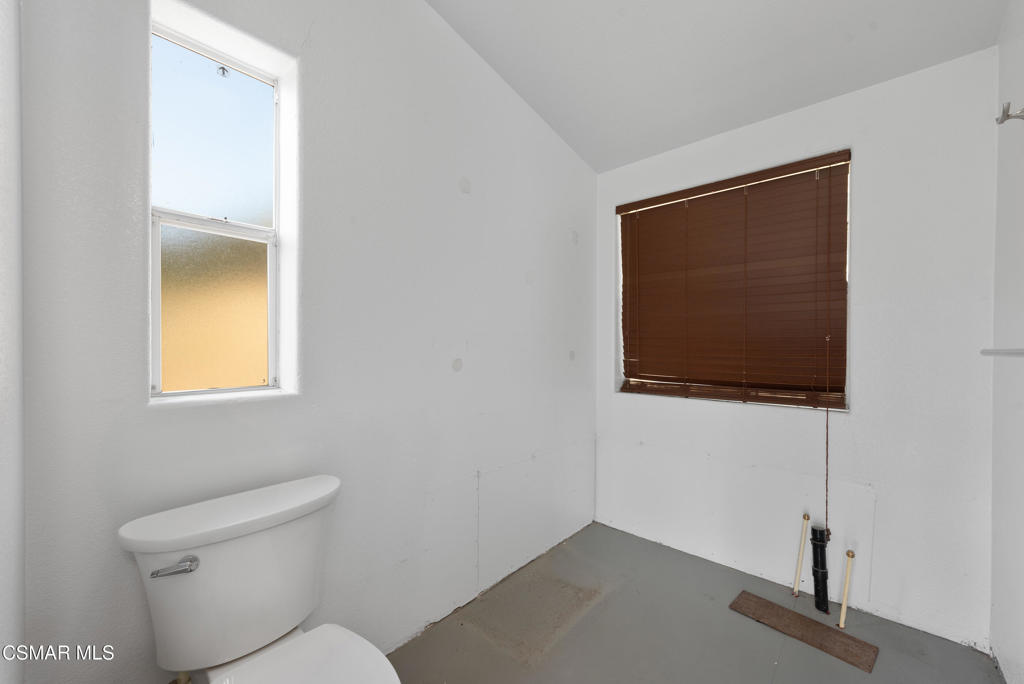 6079 Cedar Street Simi Valley, CA 93063 - Photo 14 of 31 a bathroom with a toilet