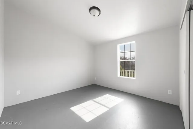 an empty room with a window