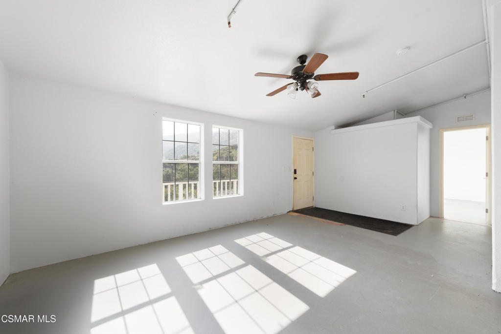 6079 Cedar Street Simi Valley, CA 93063 - Photo 5 of 31 a view of an empty room with a window