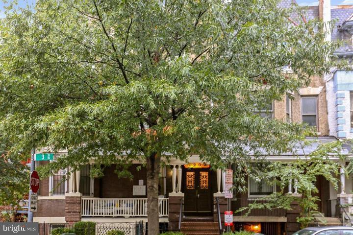 1900 3rd Street Northwest, Unit 1 Washington, DC 20001 - Photo 1 of 20 a view of a building with tree s