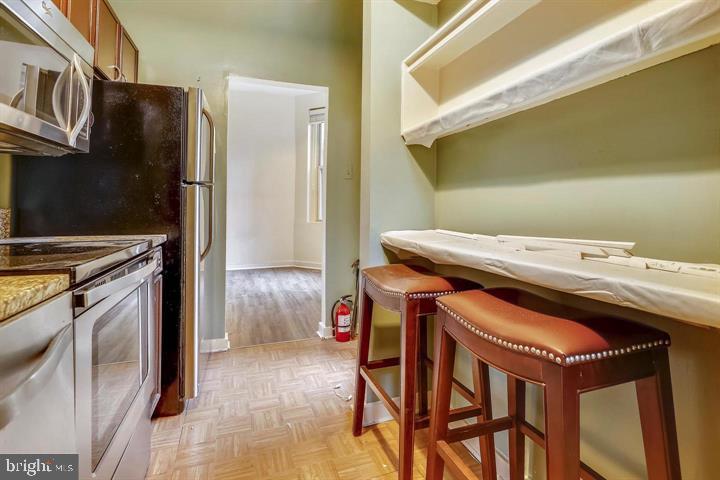 1900 3rd Street Northwest, Unit 1 Washington, DC 20001 - Photo 12 of 20 a utility room with dryer and washer