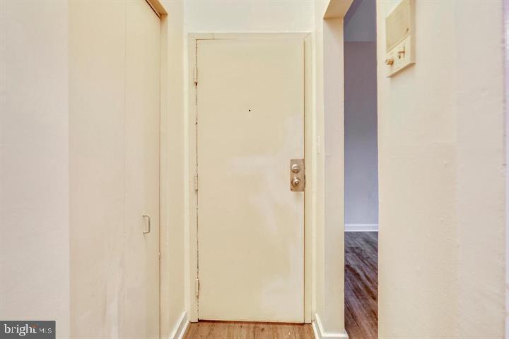 1900 3rd Street Northwest, Unit 1 Washington, DC 20001 - Photo 19 of 20 a view of a hallway with wooden floor