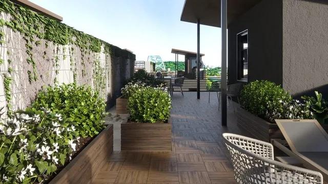 a lobby with furniture and potted plants