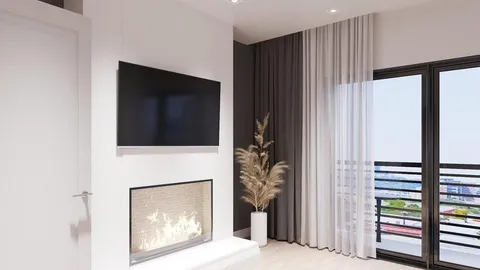 a living room with a fireplace and a flat screen tv