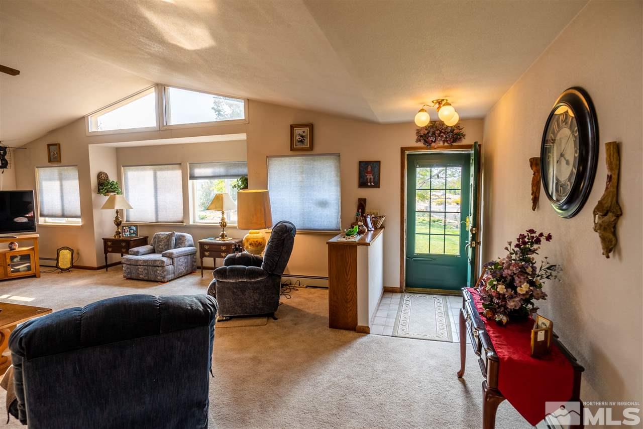 817 Rubio Way Gardnerville, NV 89460 - Photo 12 of 28 a living room with furniture flowerpot and a window