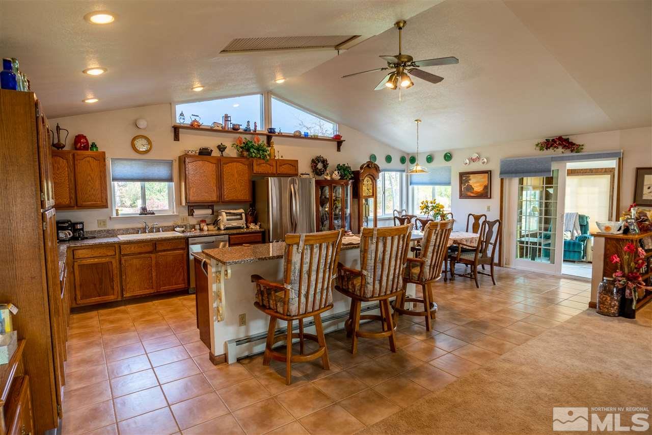 817 Rubio Way Gardnerville, NV 89460 - Photo 13 of 28 a view of a kitchen with appliances and furniture