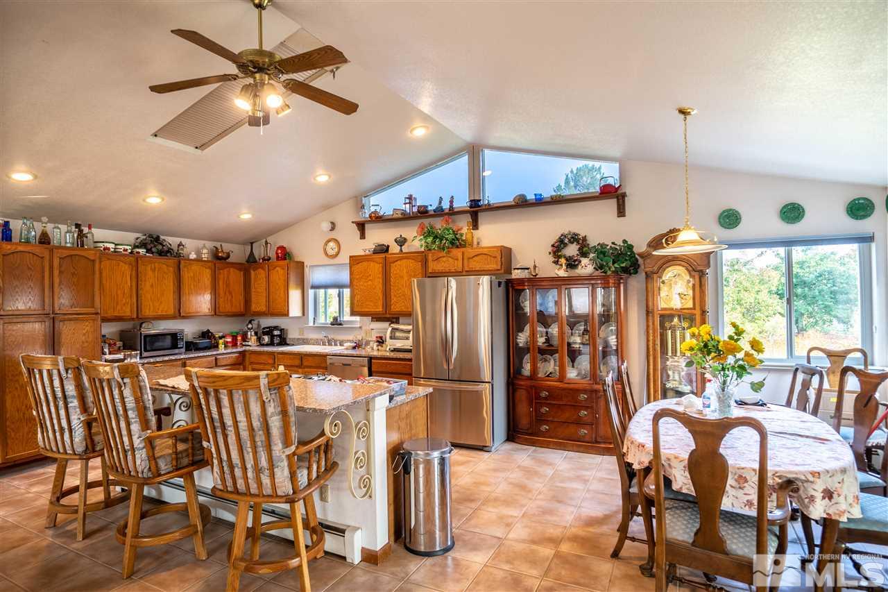 817 Rubio Way Gardnerville, NV 89460 - Photo 14 of 28 a view of a dining room with furniture window and outside view