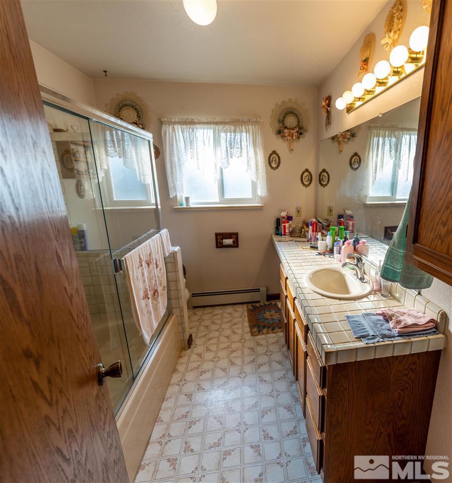 817 Rubio Way Gardnerville, NV 89460 - Photo 20 of 28 a view of a hallway with furniture and windows