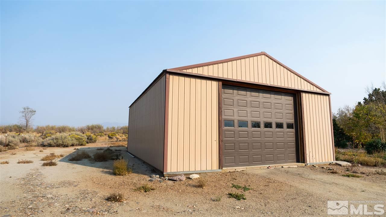817 Rubio Way Gardnerville, NV 89460 - Photo 8 of 28 a view of a house with wooden fence