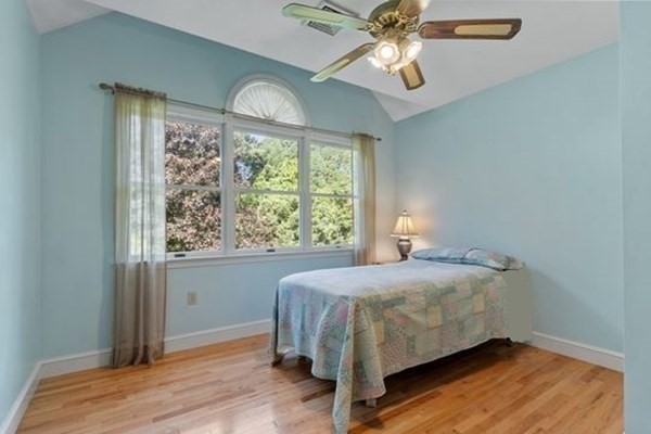 77 Teele Road Bolton, MA 01740 - Photo 20 of 41 a bedroom with a bed and a window