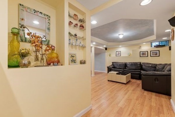 77 Teele Road Bolton, MA 01740 - Photo 28 of 41 a living room with furniture and wooden floor
