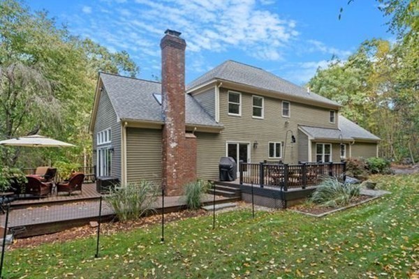 77 Teele Road Bolton, MA 01740 - Photo 35 of 41 a front view of a house with patio
