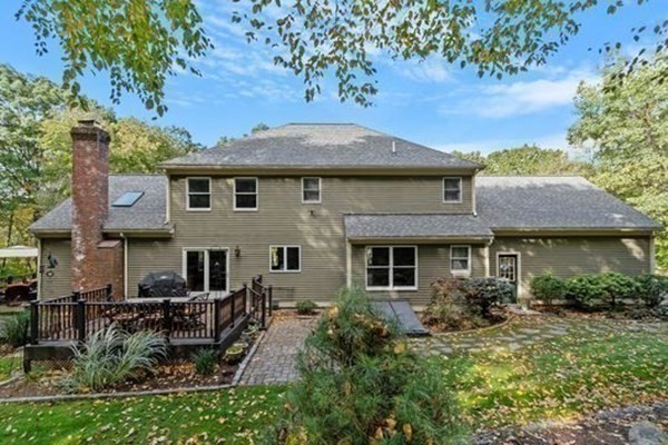 77 Teele Road Bolton, MA 01740 - Photo 36 of 41 a front view of a house with garden