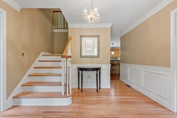 77 Teele Road Bolton, MA 01740 - Photo 4 of 41 a view of entryway and hall with wooden floor