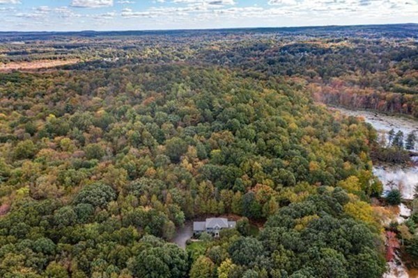 77 Teele Road Bolton, MA 01740 - Photo 41 of 41 a view of a dry yard with large trees