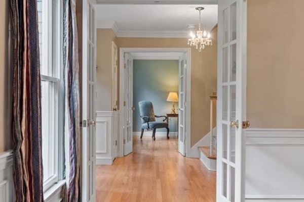 77 Teele Road Bolton, MA 01740 - Photo 5 of 41 a view of a livingroom from a hallway