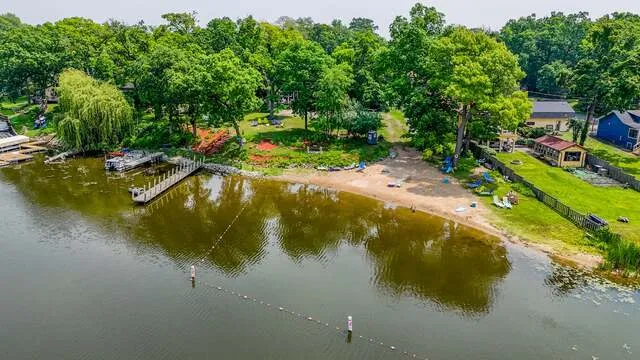 a view of swimming pool with a yard