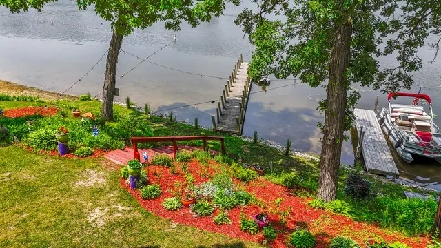 a view of a golf course with a tree
