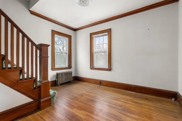 a view of backyard with window and entryway