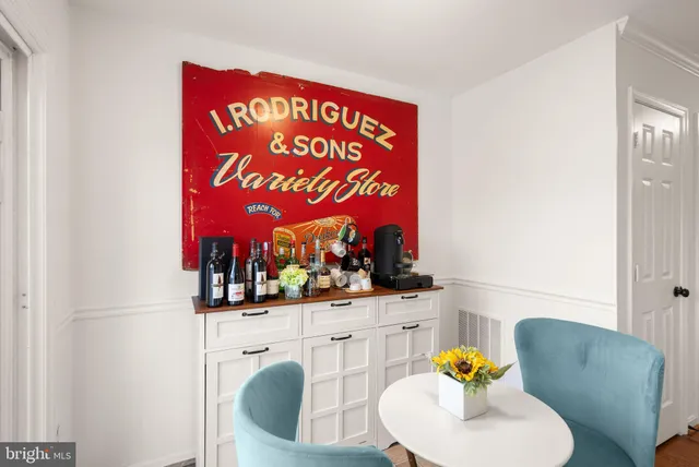a bathroom with a sink a vanity and a mirror