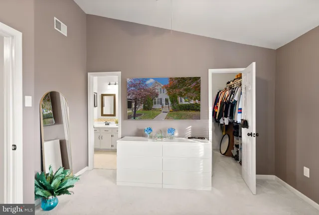 a white toilet sitting next to a shower curtain