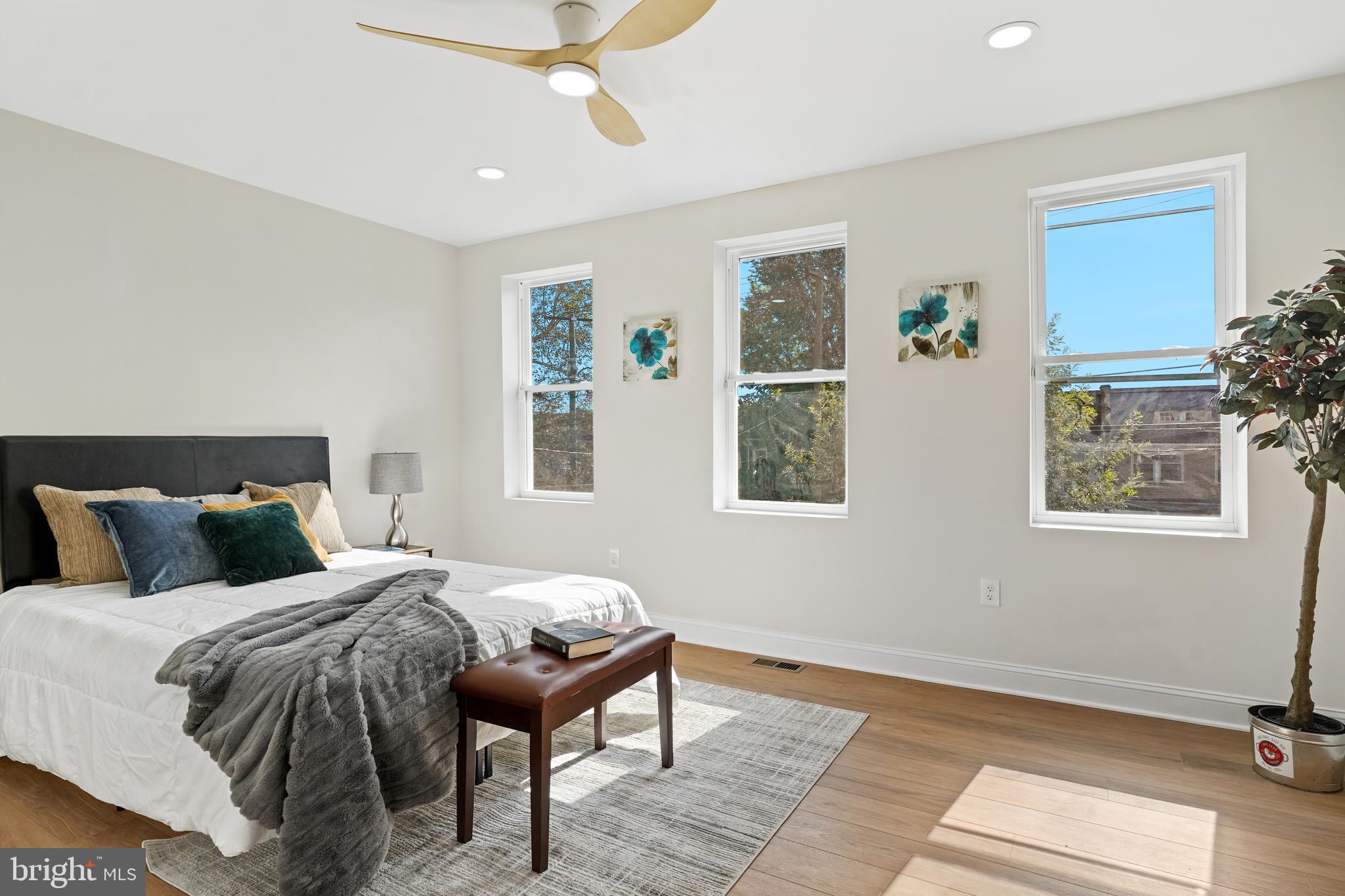 715 Longfellow Street Northwest Washington, DC 20011 - Photo 11 of 21 a bedroom with a bed and a window