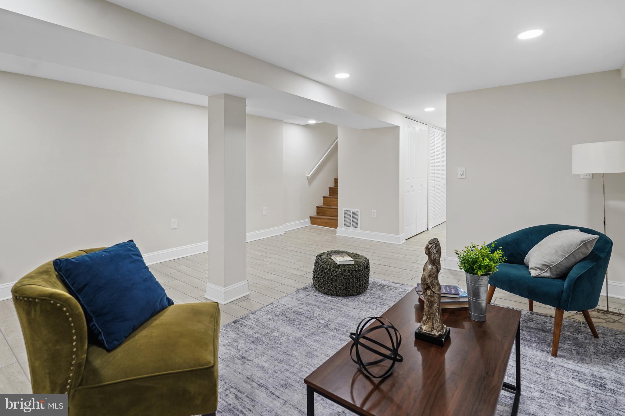 715 Longfellow Street Northwest Washington, DC 20011 - Photo 13 of 21 a living room with furniture and a chair