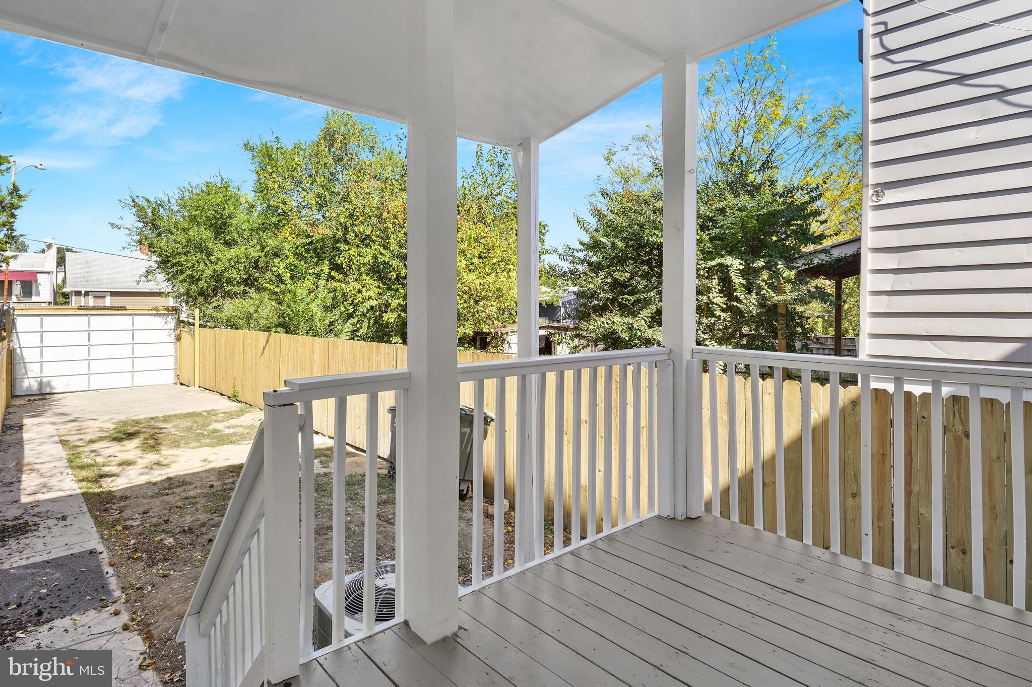 715 Longfellow Street Northwest Washington, DC 20011 - Photo 21 of 21 a view of a balcony with wooden floor