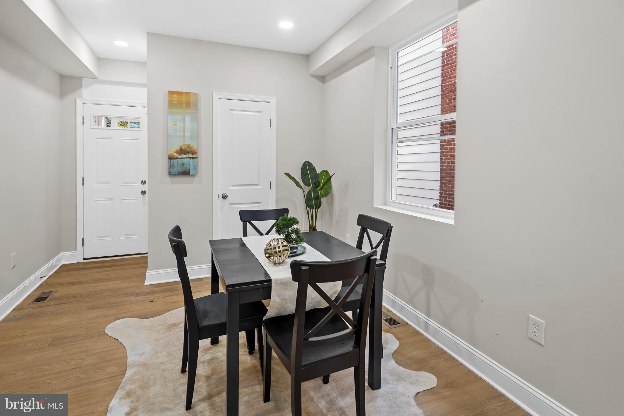 715 Longfellow Street Northwest Washington, DC 20011 - Photo 4 of 21 a view of a dining room with furniture and window