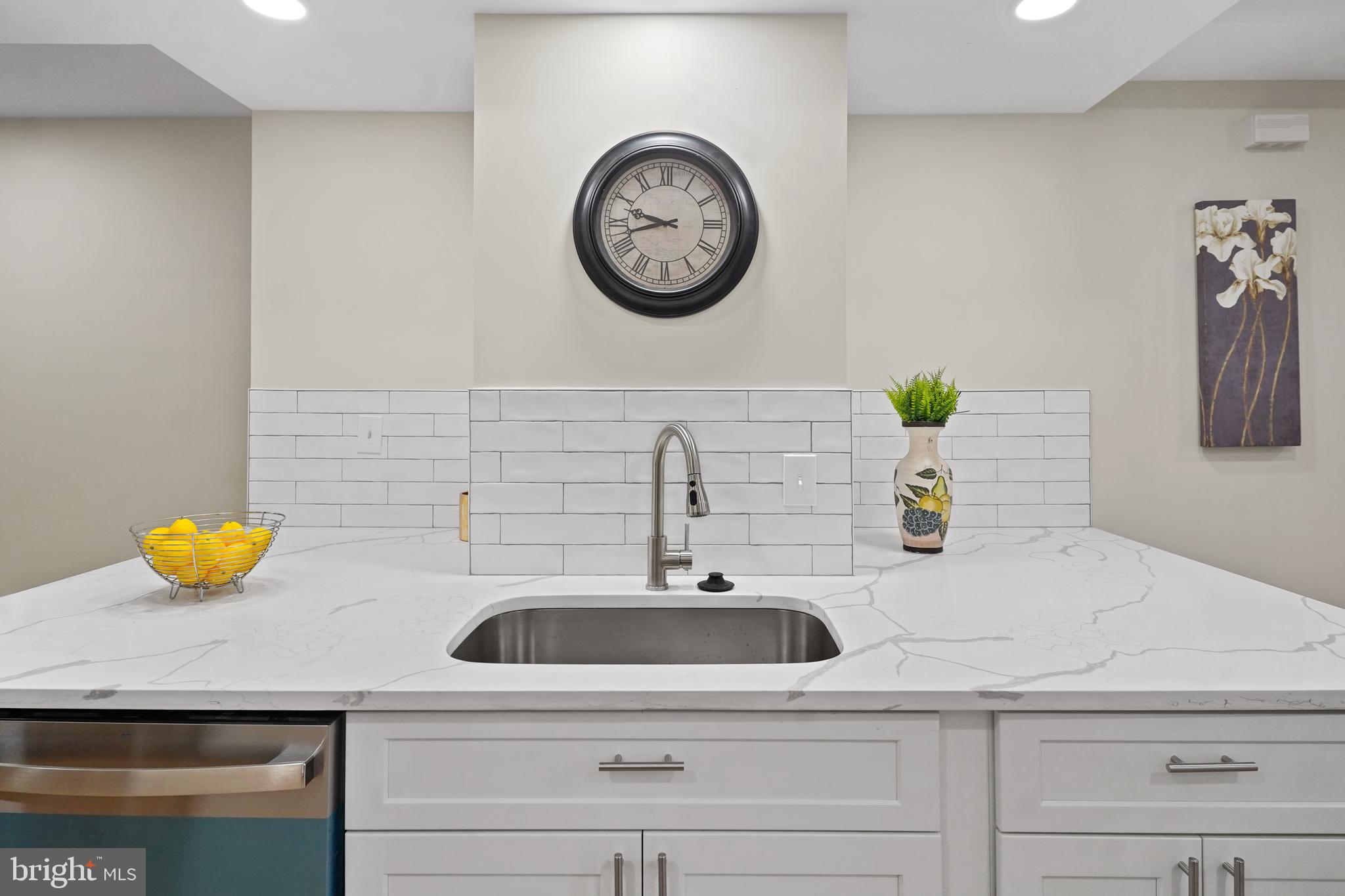 715 Longfellow Street Northwest Washington, DC 20011 - Photo 5 of 21 a bathroom with a sink and a mirror