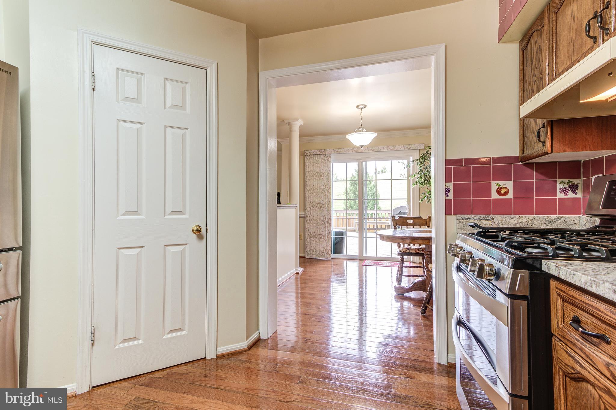 21787 Canfield Terrace Sterling, VA 20164 - Photo 14 of 46 Kitchen opens up to the breakfast area with views
