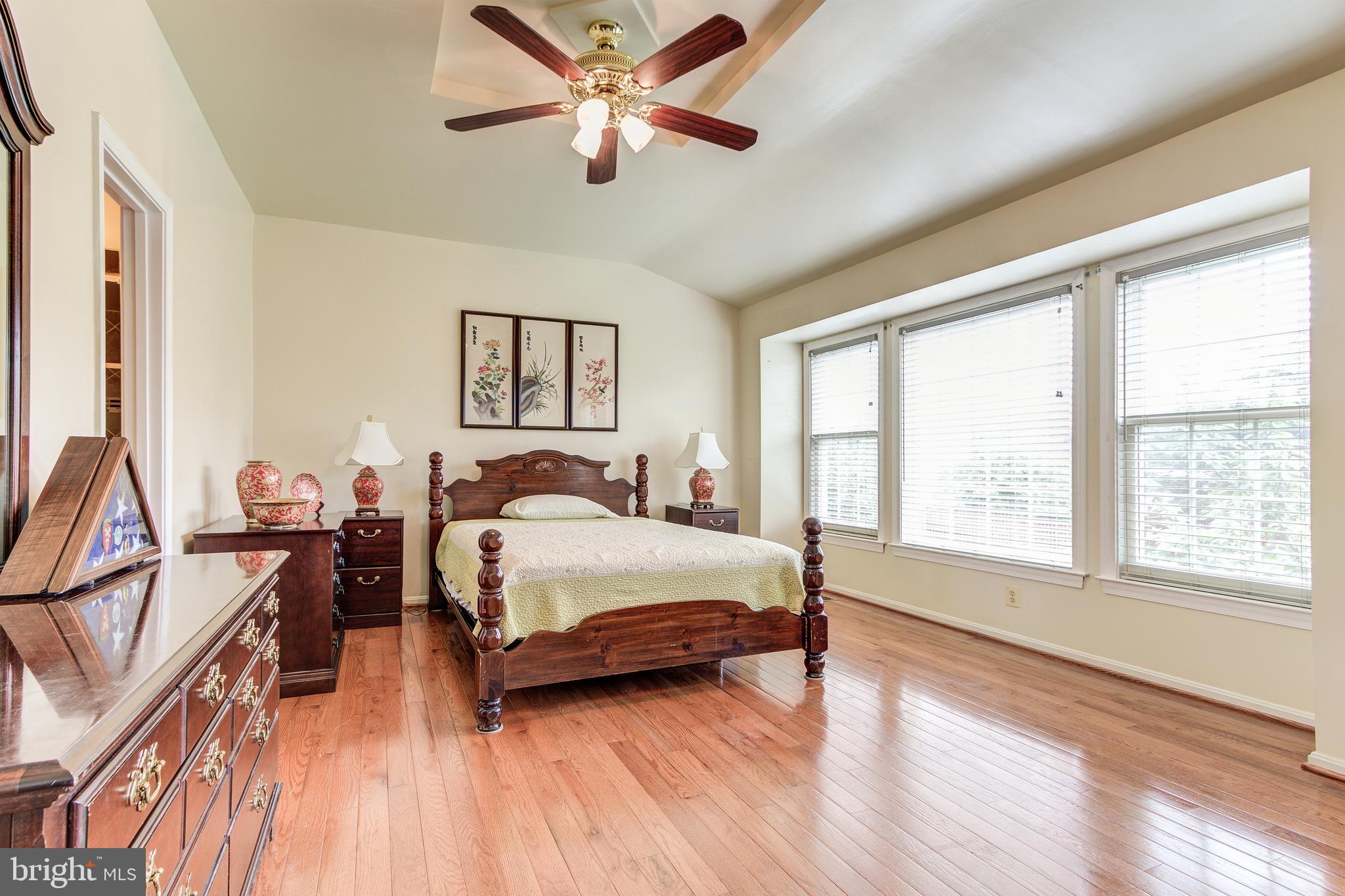 21787 Canfield Terrace Sterling, VA 20164 - Photo 24 of 46 Palatial primary bedroom with ample natural light