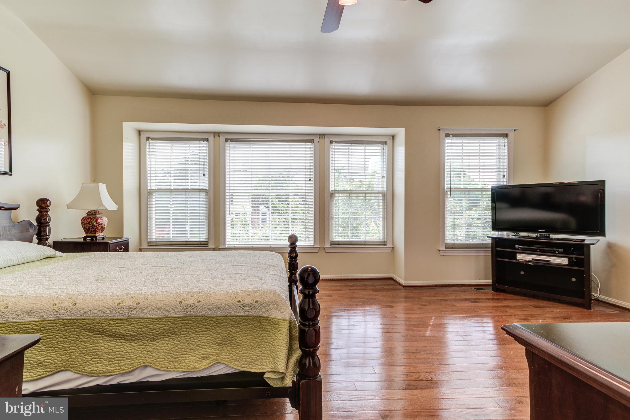 21787 Canfield Terrace Sterling, VA 20164 - Photo 27 of 46 Palatial primary bedroom with ample natural light