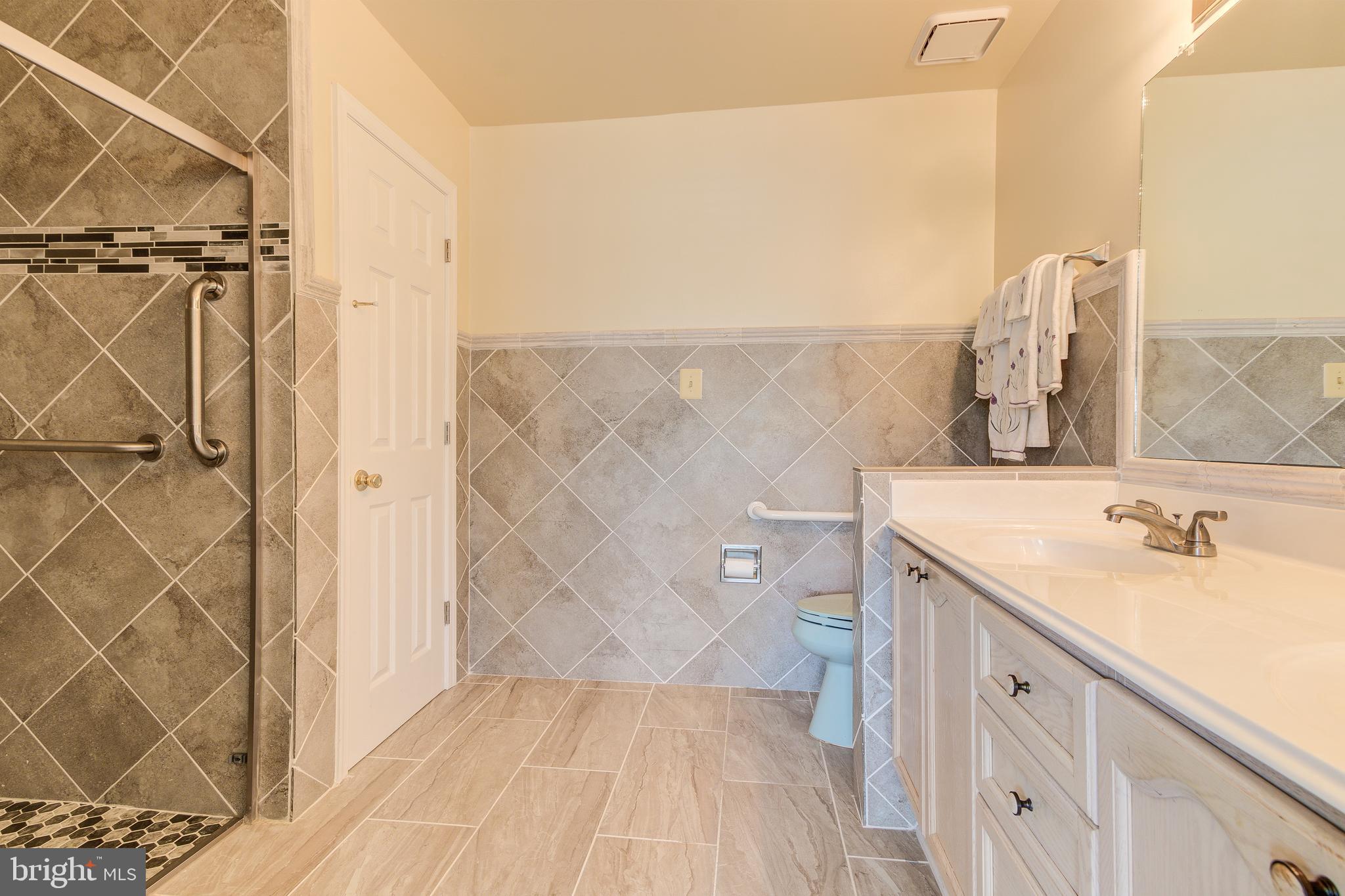 21787 Canfield Terrace Sterling, VA 20164 - Photo 29 of 46 Spacious primary bath with wheelchair access