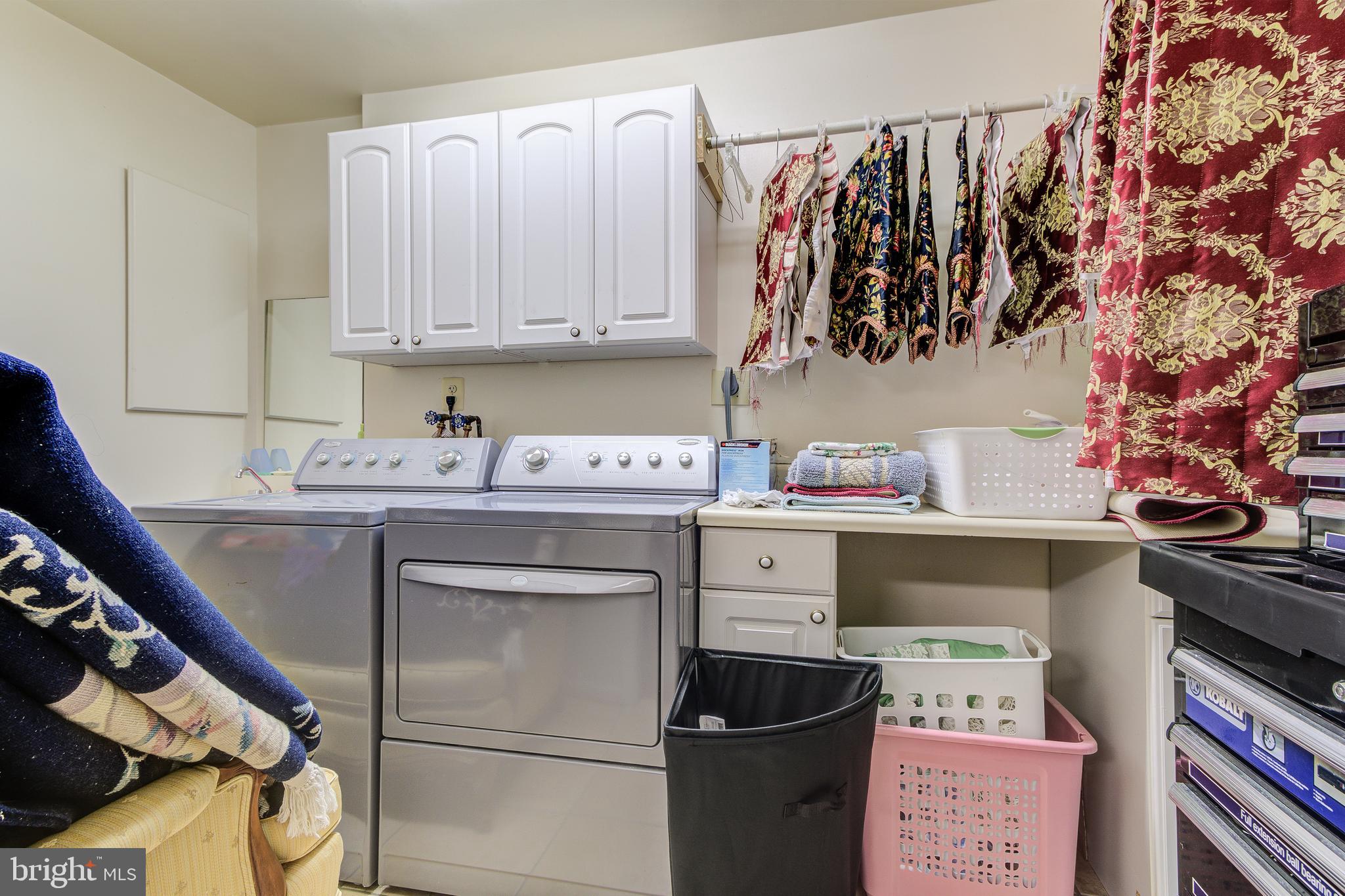 21787 Canfield Terrace Sterling, VA 20164 - Photo 41 of 46 Laundry room with plenty of storage space