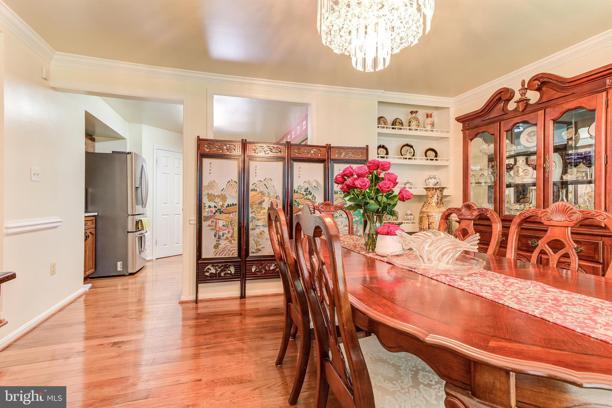 21787 Canfield Terrace Sterling, VA 20164 - Photo 10 of 46 Dining room leads to the kitchen
