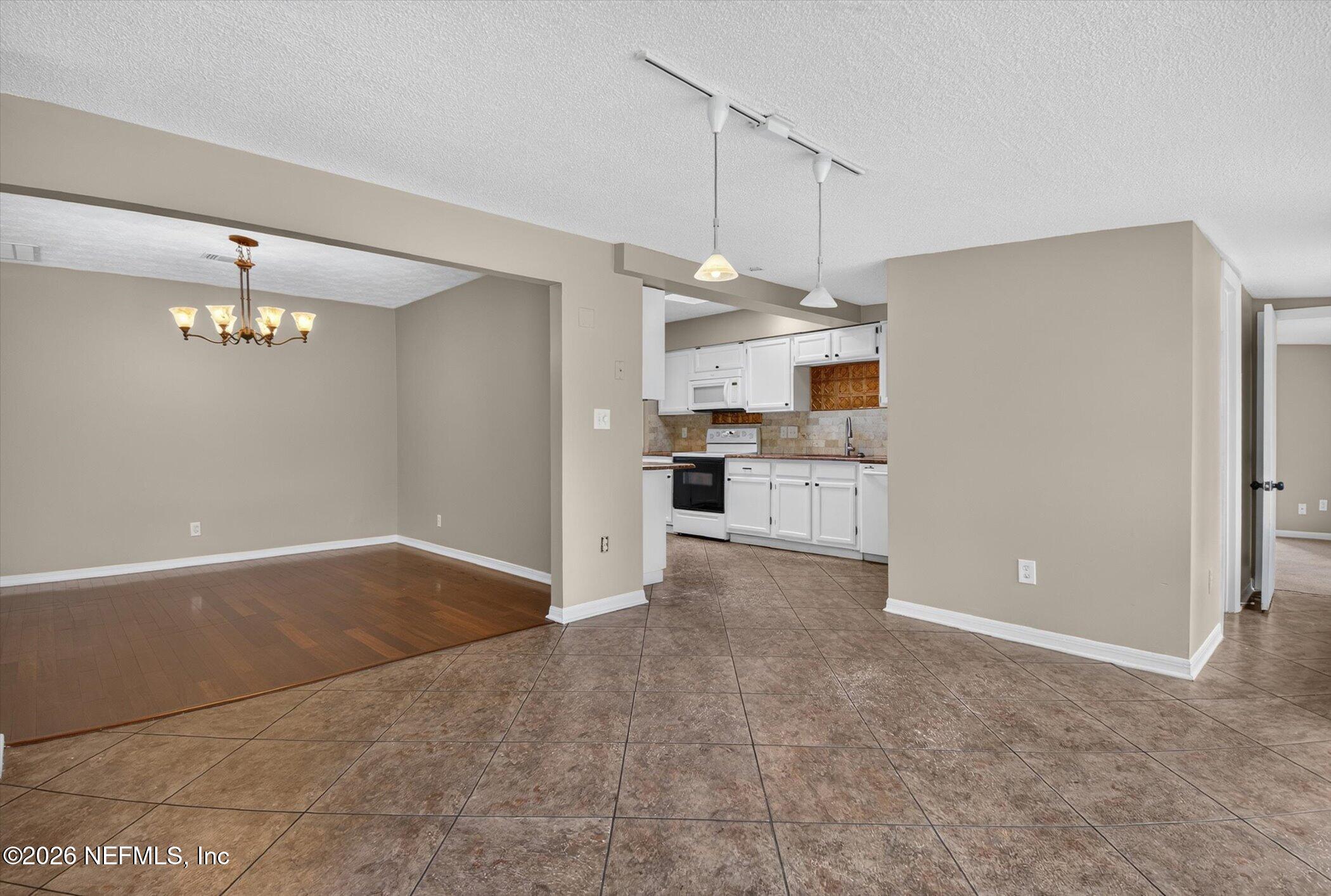 2705 Navajo Road Orange Park, FL 32073 - Photo 18 of 58 a view of a kitchen with a sink and dishwasher kitchen view