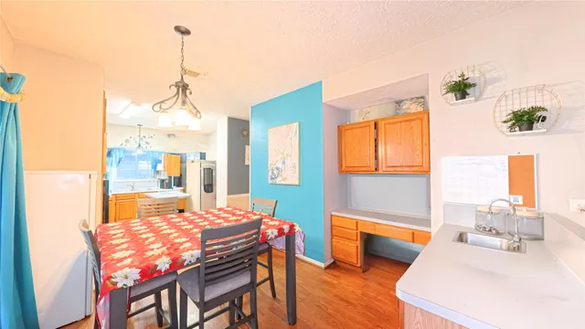 a dining room with a table or chairs and a wooden floor