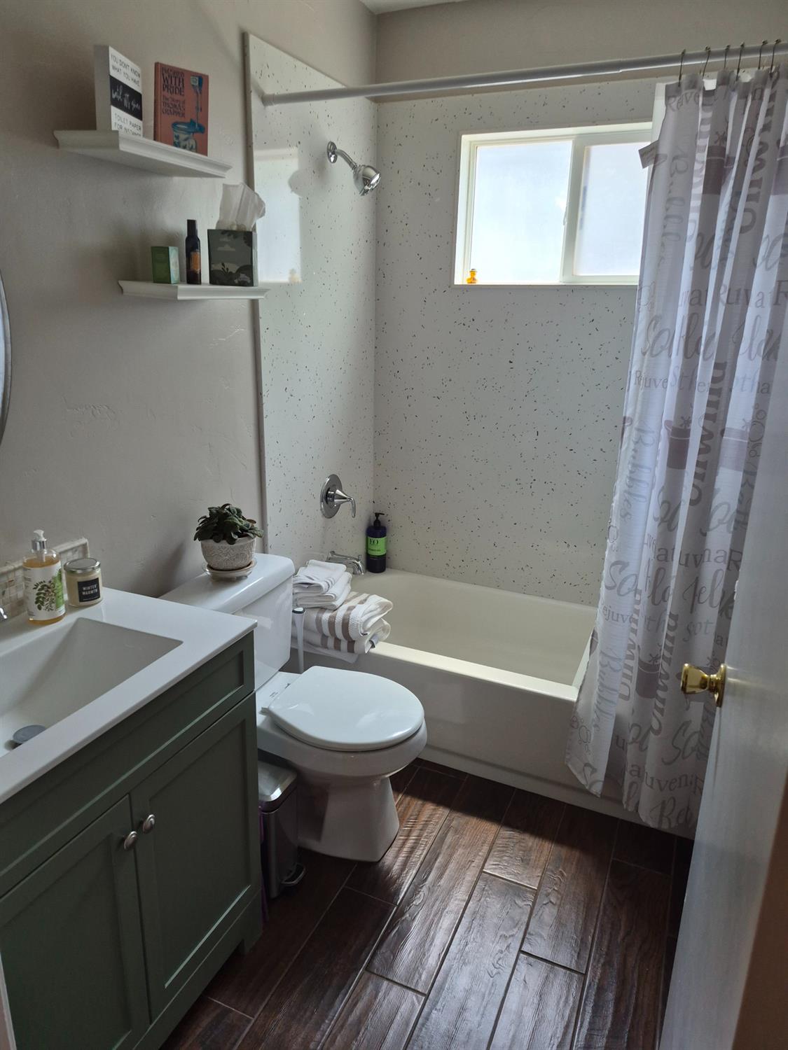 5817 Keyntel Street Citrus Heights, CA 95621 - Photo 18 of 30 a bathroom with a double vanity sink toilet and shower