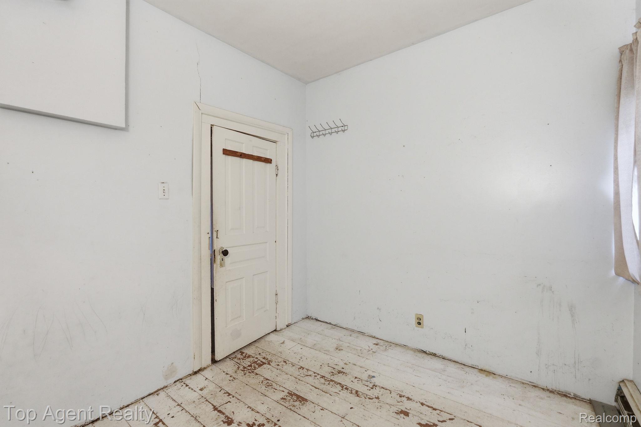 95 West Lapeer Road Peck, MI 48466 - Photo 10 of 33 Unfurnished room featuring light wood-style floors
