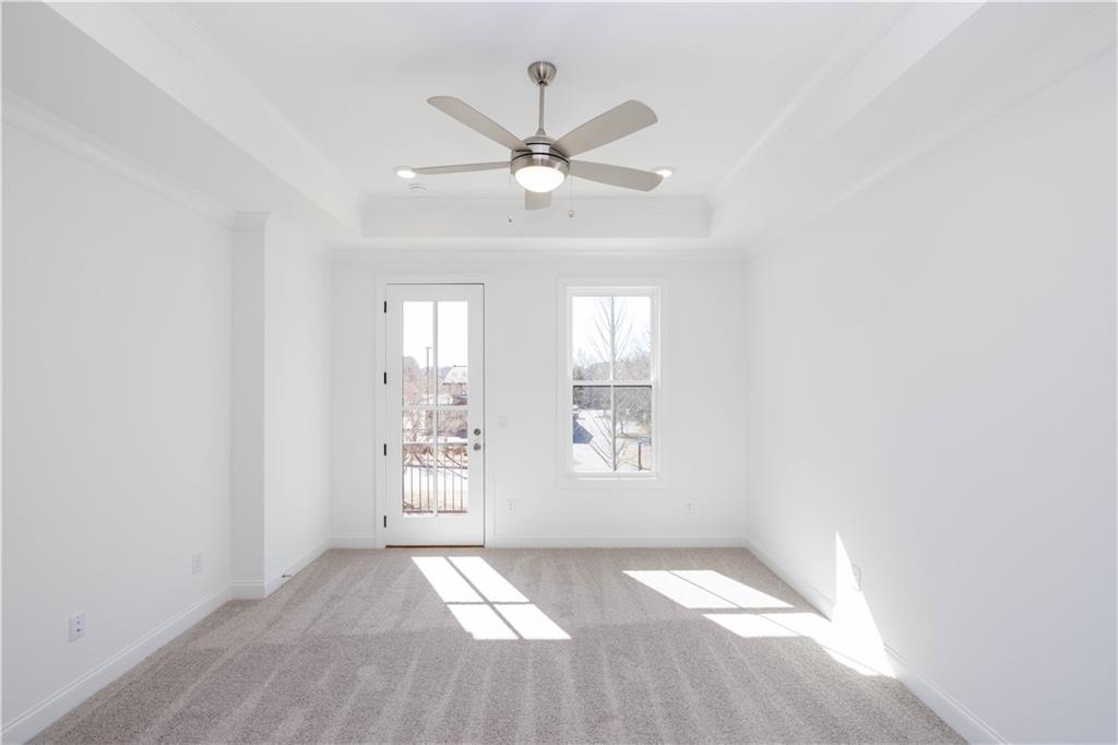 362 Olmstead Way, Unit 23 Alpharetta, GA 30022 - Photo 20 of 43 an empty room with windows and fan