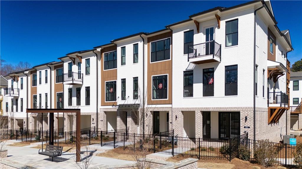 362 Olmstead Way, Unit 23 Alpharetta, GA 30022 - Photo 2 of 43 a front view of a building with street view